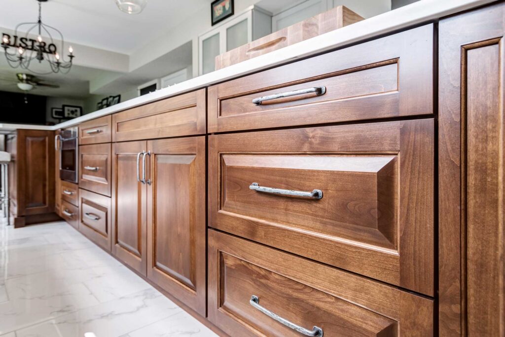 Close up of maple cabinetry of kitchen island